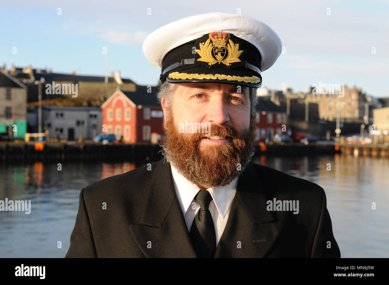 Captain Calum Grain Harbourmaster and deputy Chief Executive Lerwick Port Authority on Victoria Pier Lerwick Stock Photo