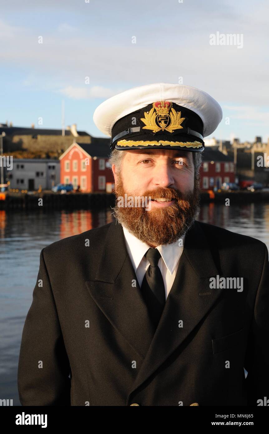 Captain Calum Grain Harbourmaster and deputy Chief Executive Lerwick Port Authority on Victoria Pier Lerwick Stock Photo