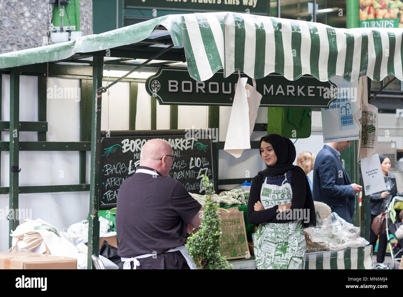 SOUTHWARK, LONDONSEPTEMBER 7,2017 Woman is selling aprons, tea towels