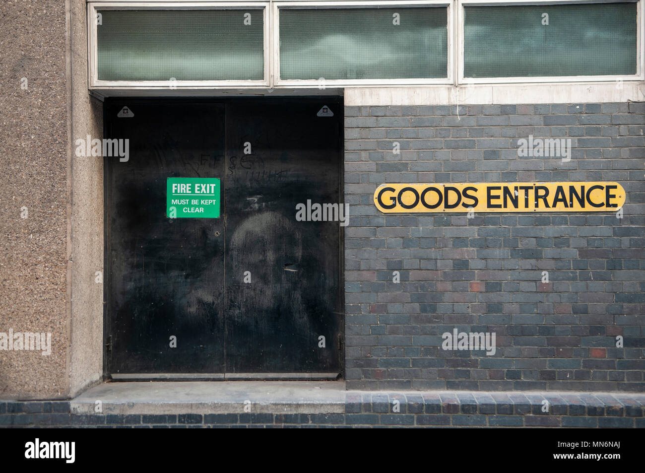 Goods entrance at the rear of a shop. Stock Photo