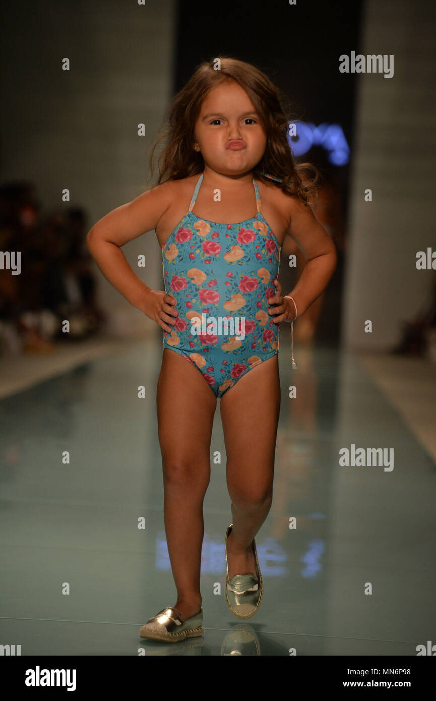 MIAMI BEACH, FL - JULY 23: A model walks the runway during LILIANA MONTOYA  Runway at FUNKSHION