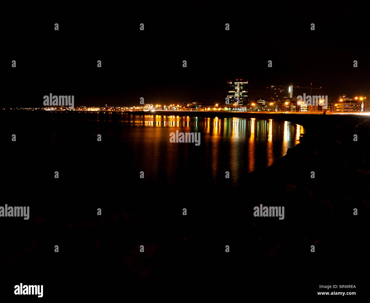 Night view of the coast in the city of Reykjavik, Iceland, city lights Stock Photo