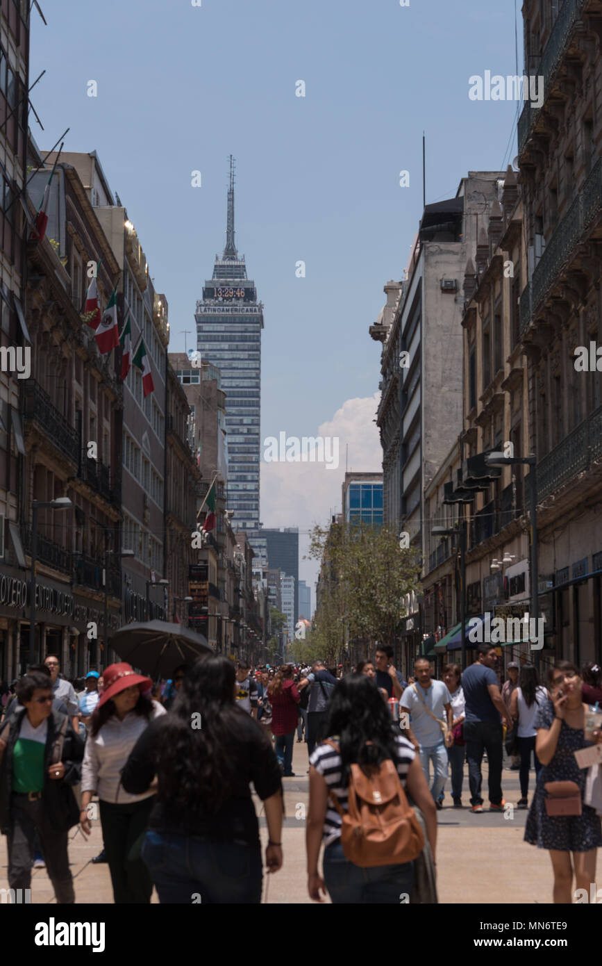 People walk at Madero street in Mexico City's historic city center Stock Photo