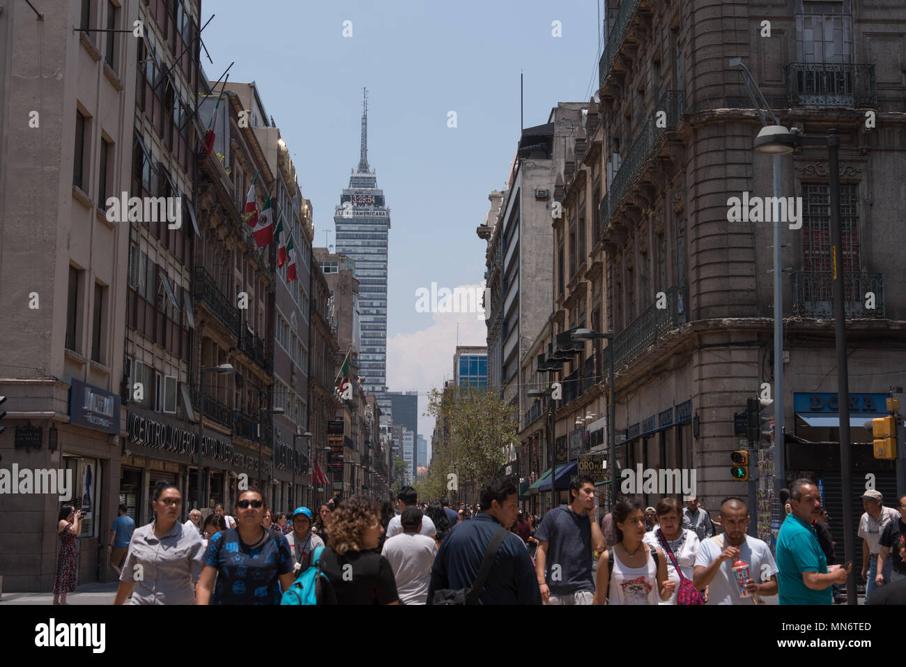 People walk at Madero street in Mexico City's historic city center Stock Photo