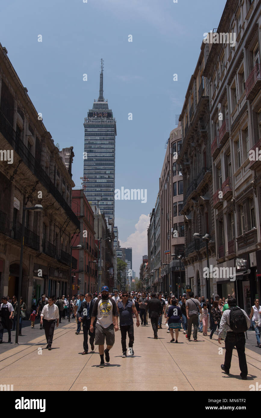 People walk at Madero street in Mexico City's historic city center Stock Photo