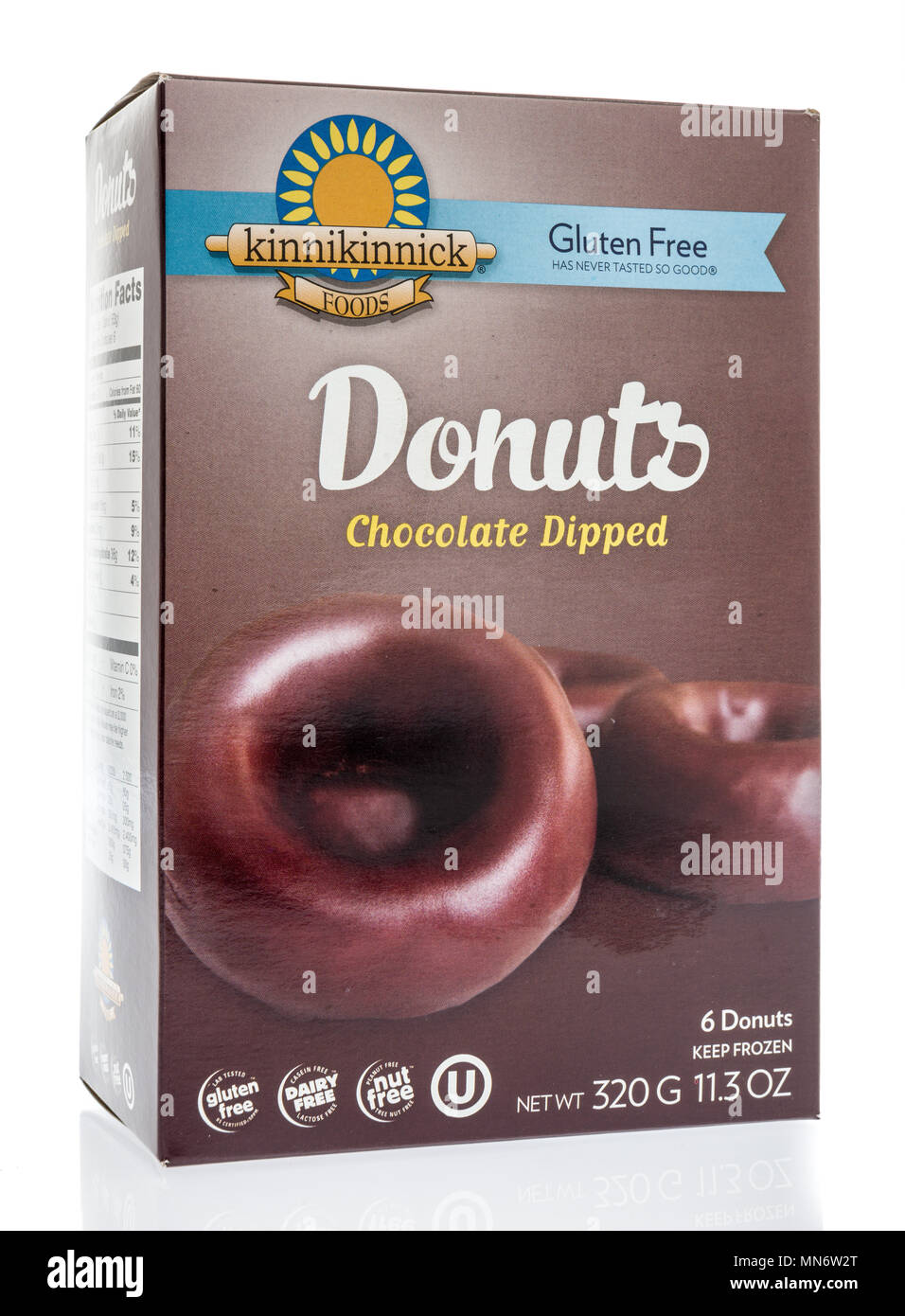 Winneconne, WI - 8 May 2018:  A box of Kinnikinnick foods donuts chocolate dipped on an isolated background Stock Photo