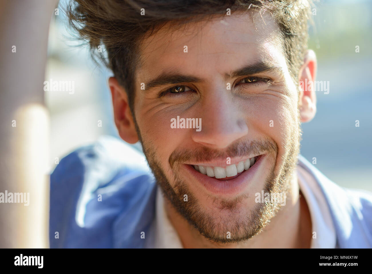 Cheerful attractive man smiling close hi-res stock photography and ...