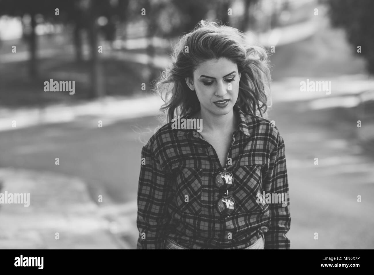 Beautiful Sad Young Woman In The Park Girl With Long Blonde Curly