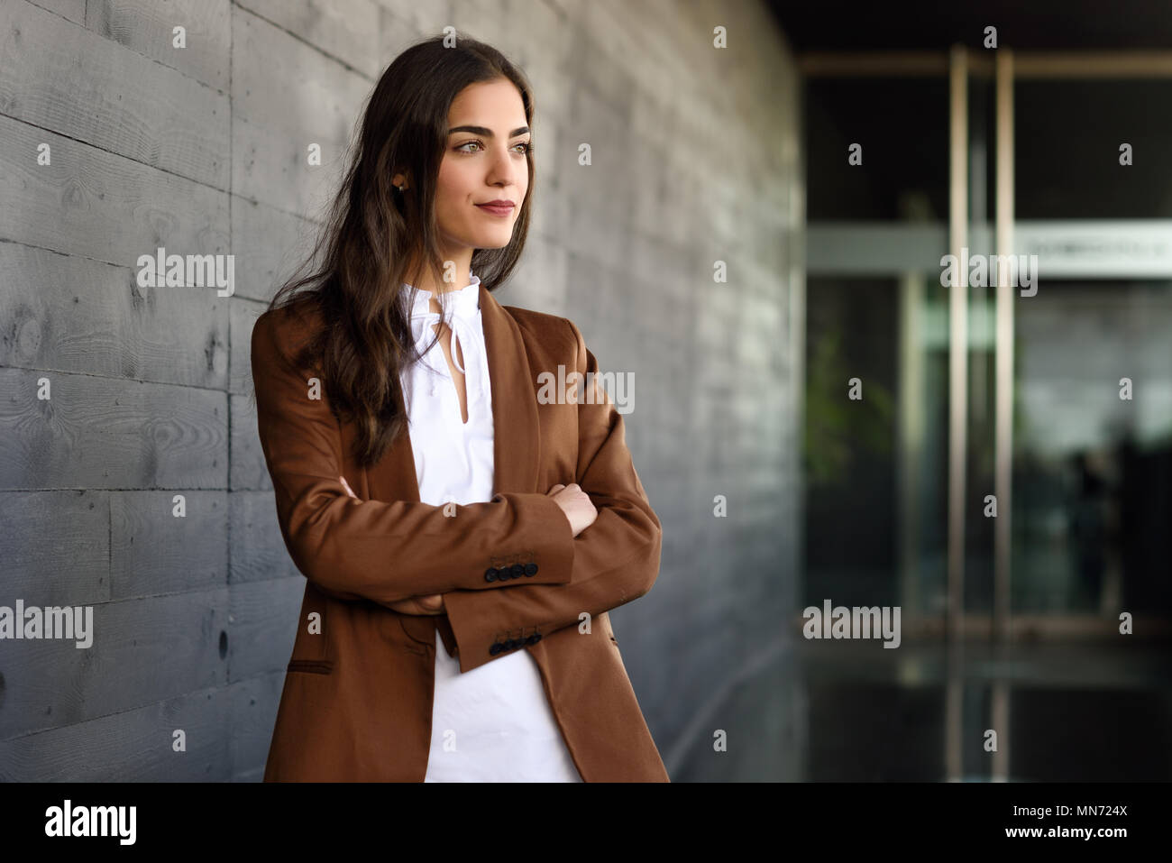 Young Businesswoman Standing Outside Of Office Building Beautiful