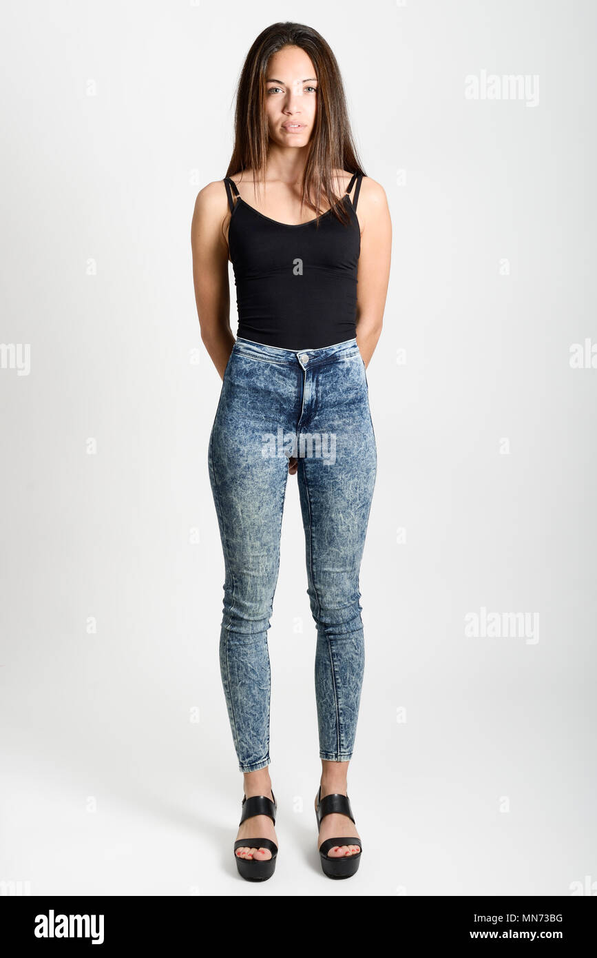 Woman wearing tight blue jeans hi-res stock photography and images - Alamy
