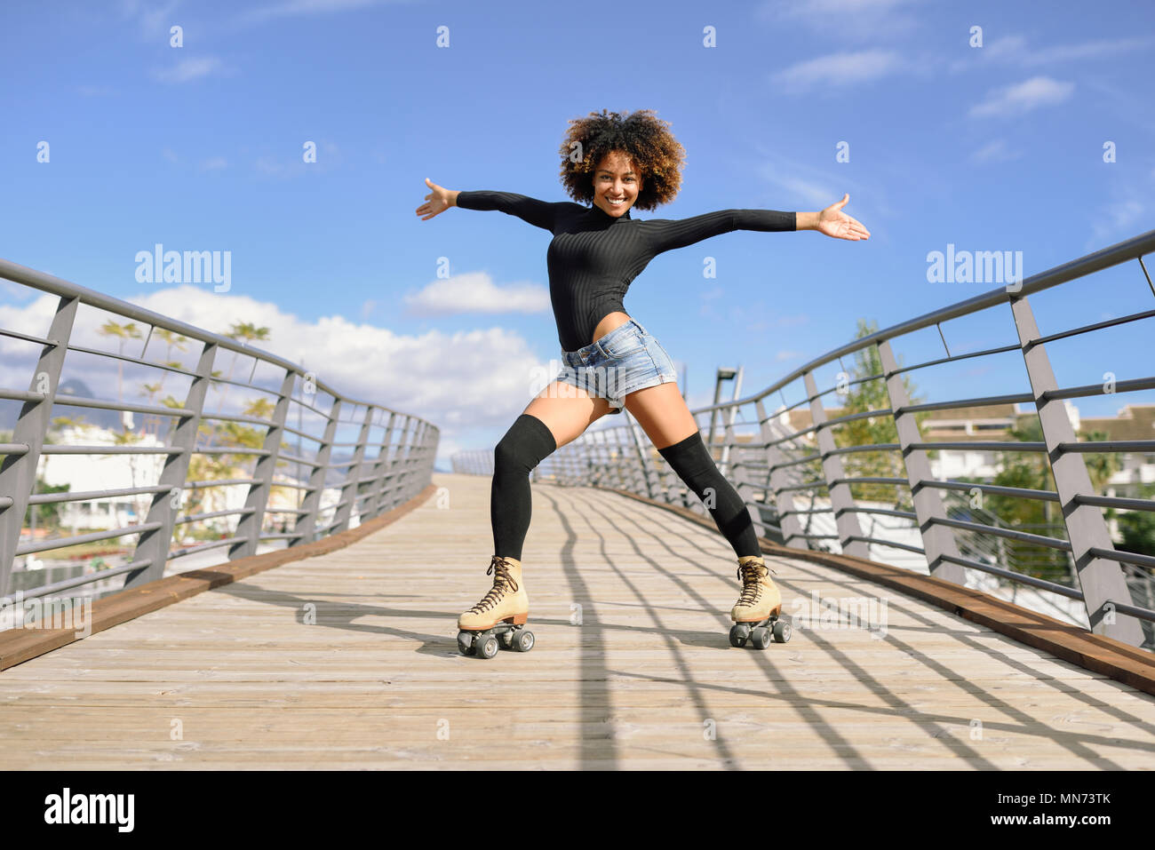 Female rollerblading hi-res stock photography and images - Alamy