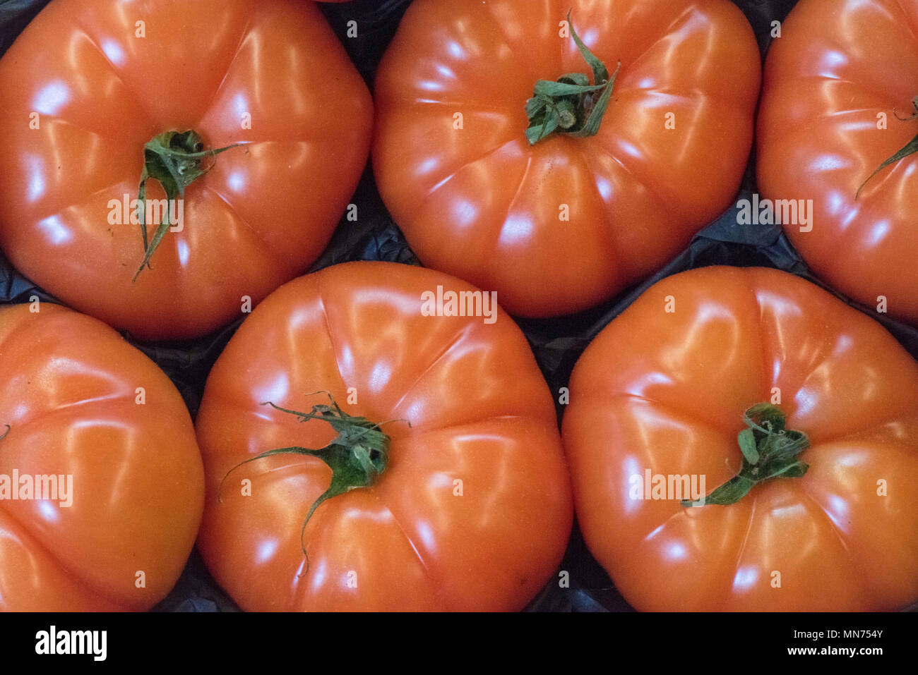 beefsteak tomatoes on display for healthy eating and red colourful