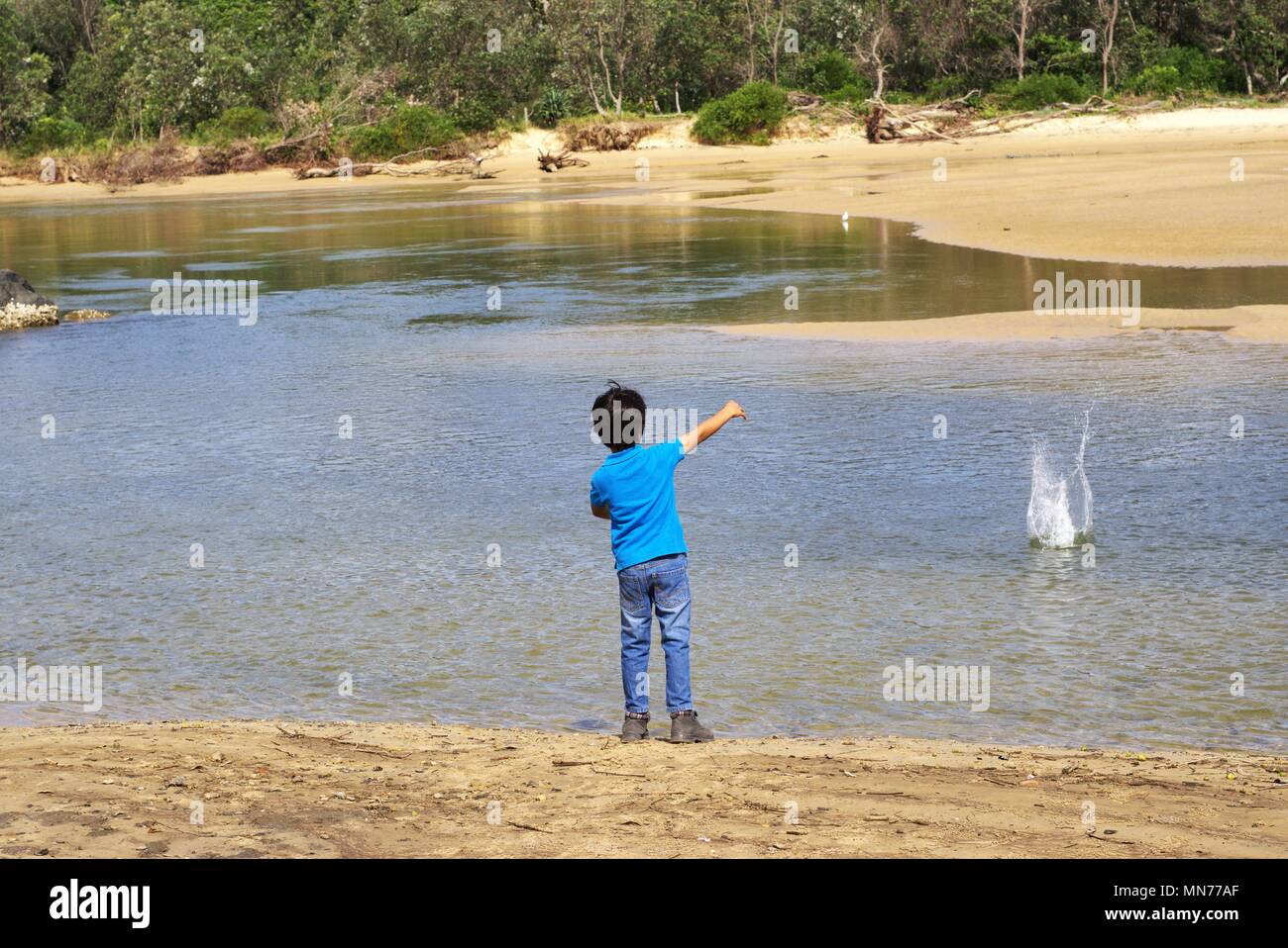 Throwing stone in water hires stock photography and images Alamy