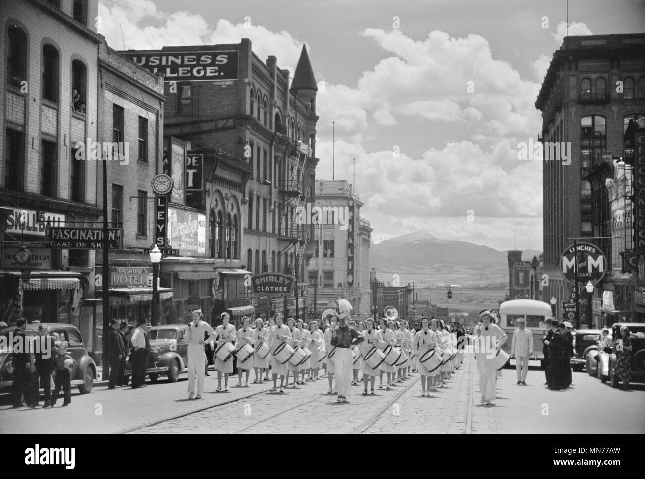 High School Band Marching in Parade, Montana Street, Butte, Montana, USA, Arthur Rothstein for Farm Security Administration, July 1939 Stock Photo