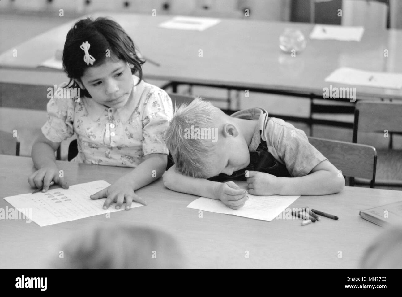 Two Children of Migratory Workers in Elementary School Classroom at FSA Camp, Weslaco, Texas, USA, Arthur Rothstein for Farm Security Administration, February 1942 Stock Photo