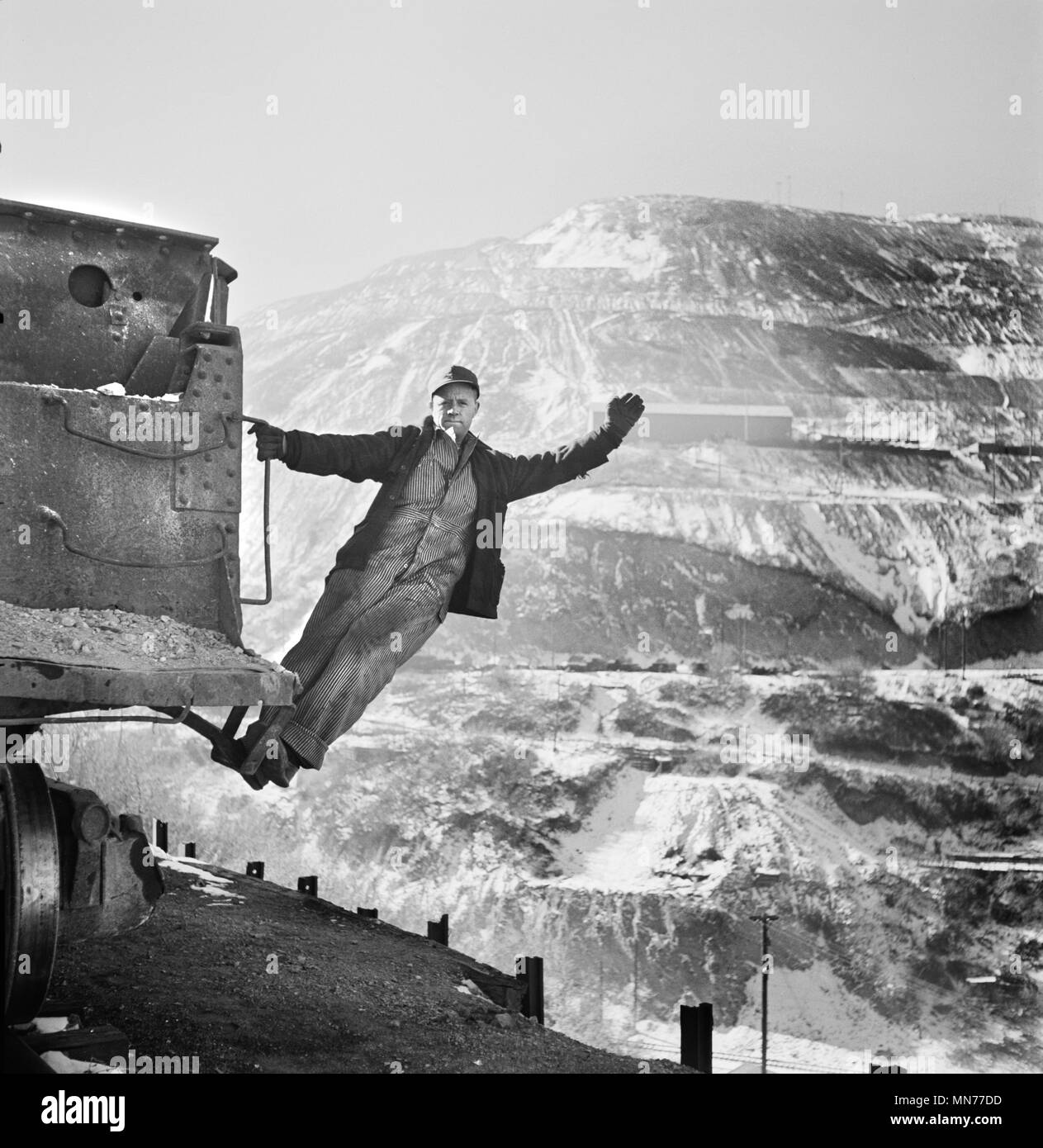 Brakeman of an Ore Train at Open-Pit Mining Operations, Utah Copper Company, Bingham Canyon, Utah, USA, Andreas Feininger for Office of War Information, November 1942 Stock Photo