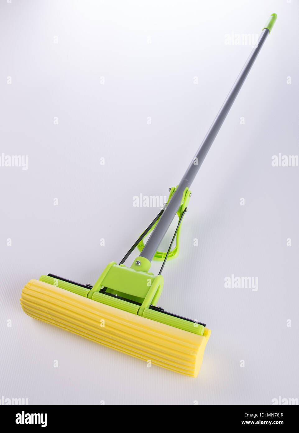 https://c8.alamy.com/comp/MN78JR/mop-or-plastic-mop-with-aluminum-handle-MN78JR.jpg