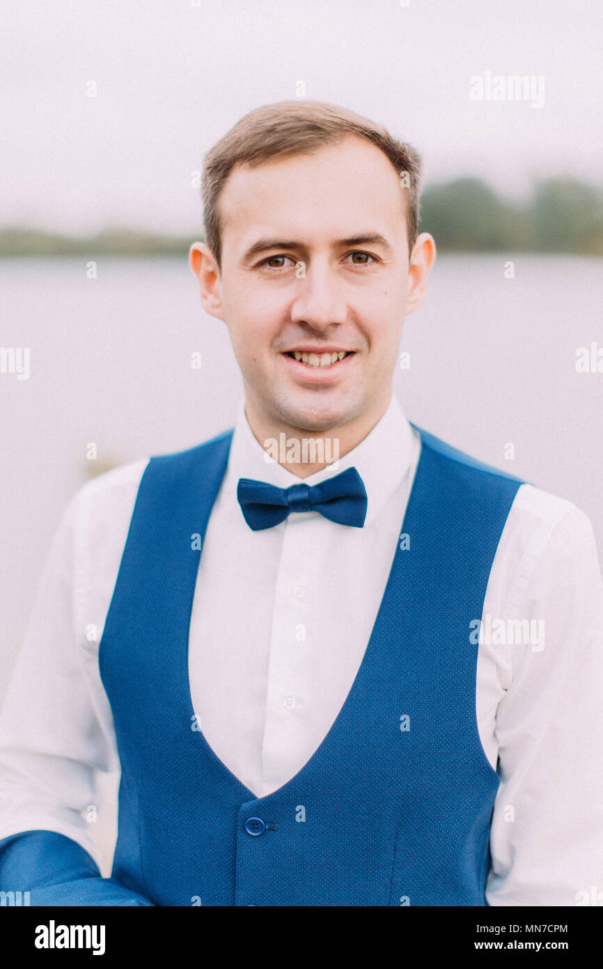 Handsome smiling groom close hi-res stock photography and images - Alamy