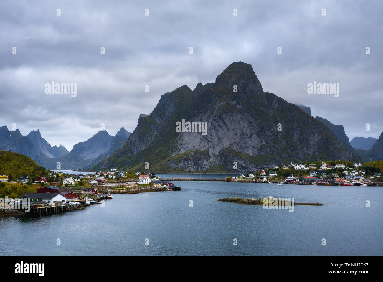 Mount Olstind and Reine fishing village on Lofoten islands Stock Photo