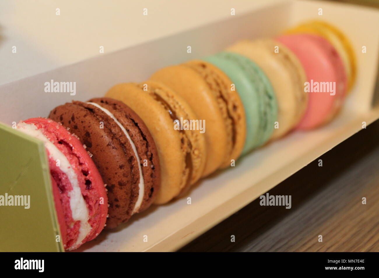 Colourful Macarons in a Display Case Stock Photo - Alamy