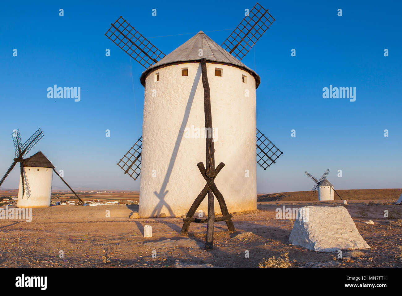 Traditional windmills at rising, Campo de Criptana, La Mancha, Spain. Back view Stock Photo