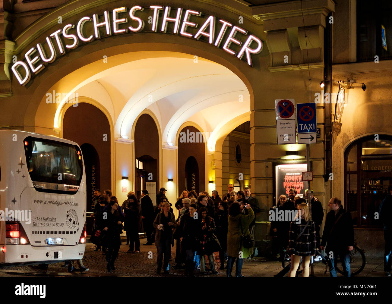 People spill out of the Deutsches Theater on Schwanthalerstrasse Munich after a Saturday night performance Stock Photo