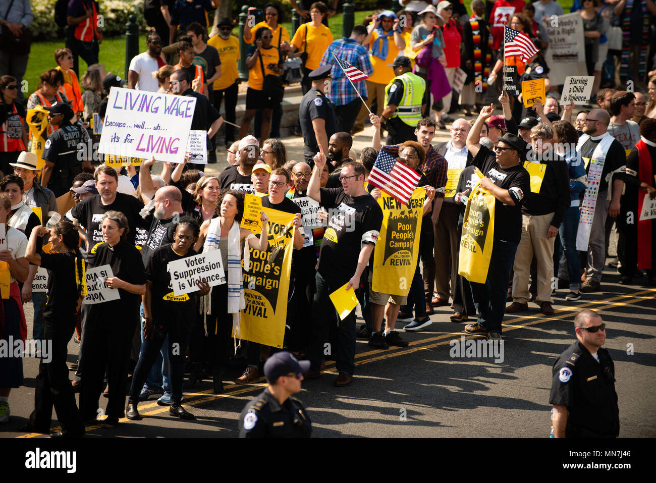 Washington, DC, USA. 14th May, 2018. Marchers at the start of a new Poor People's Campaign run into a police block and wait to be arrested near the U.S. Capitol in Washington, DC. The campaign, modeled after a similarly named campaign by the Rev. Dr. Martin Luther King 50 years earlier, began with rallies in about three dozen states, and is planned to last six weeks. Approximately 200 people were arrested in the various rallies, often being cited for blocking traffic. Credit: Jay Mallin/ZUMA Wire/Alamy Live News Stock Photo