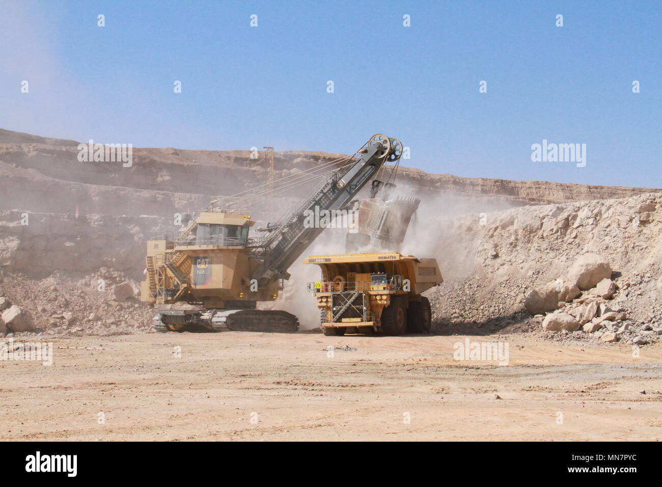 Swakopmund. 11th May, 2018. Photo taken on May 11, 2018 shows a haul truck (R) working at Husab Uranium Mine in western Namibia. The Husab mine is one of the biggest uranium mines in the world. Credit: Wu Changwei/Xinhua/Alamy Live News Stock Photo