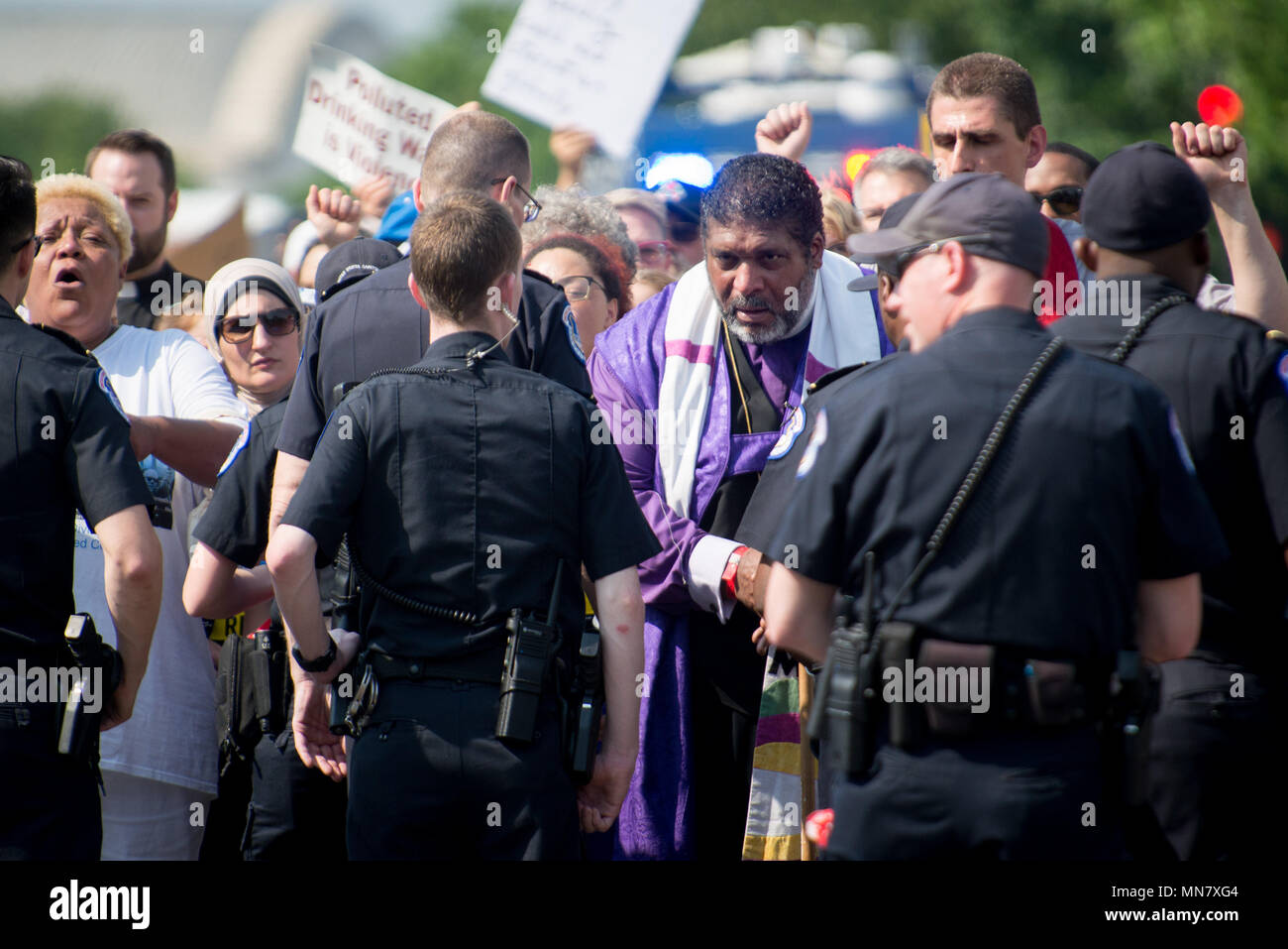 Washington, District of Columbia, USA. 14th May, 2018. Reverend William Barber leads hundreds of protesters in a rally for the Poor People's Campaign at the U.S. Capitol. Several dozen people were arrested and later released. Credit: Erin Scott/ZUMA Wire/Alamy Live News Stock Photo