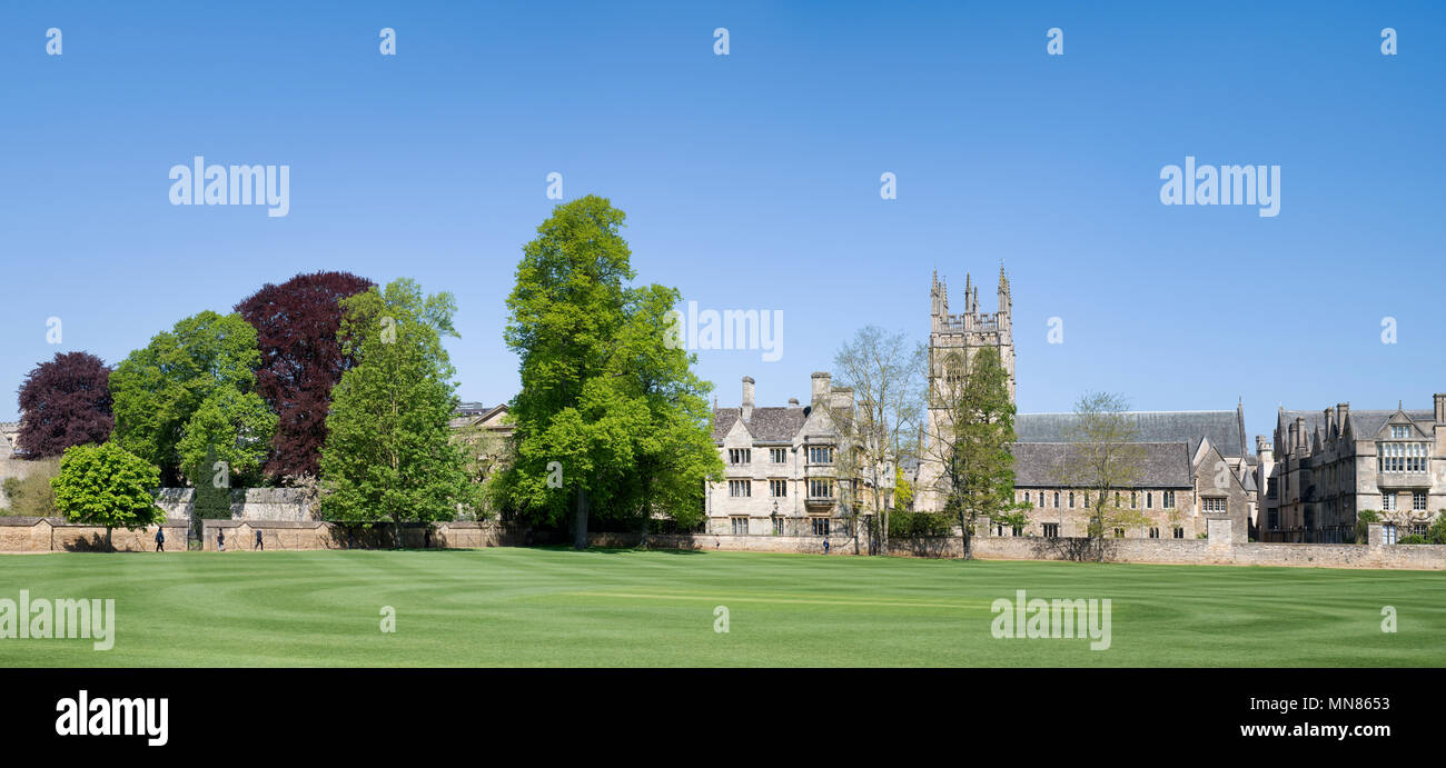 Merton college buildings and field in the spring sunshine. Oxford, Oxfordshire, England. Panoramic Stock Photo