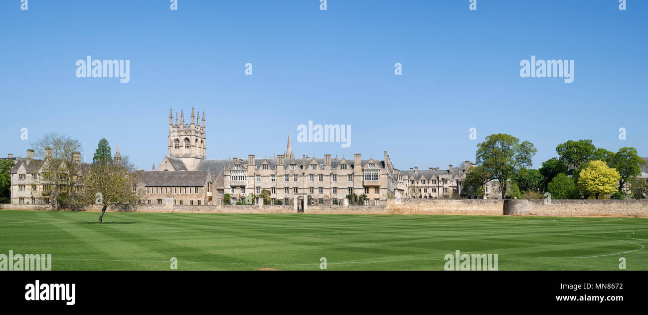 Merton college buildings and field in the spring sunshine. Oxford, Oxfordshire, England. Panoramic Stock Photo