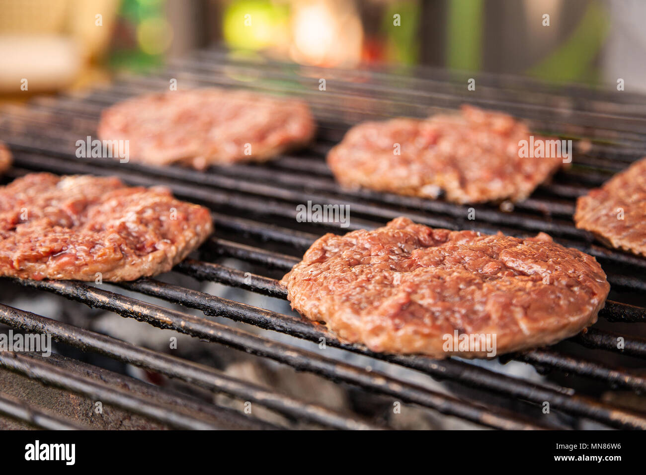 Frying in the open air in a charcoal burger for burgers on charcoal Stock Photo Alamy
