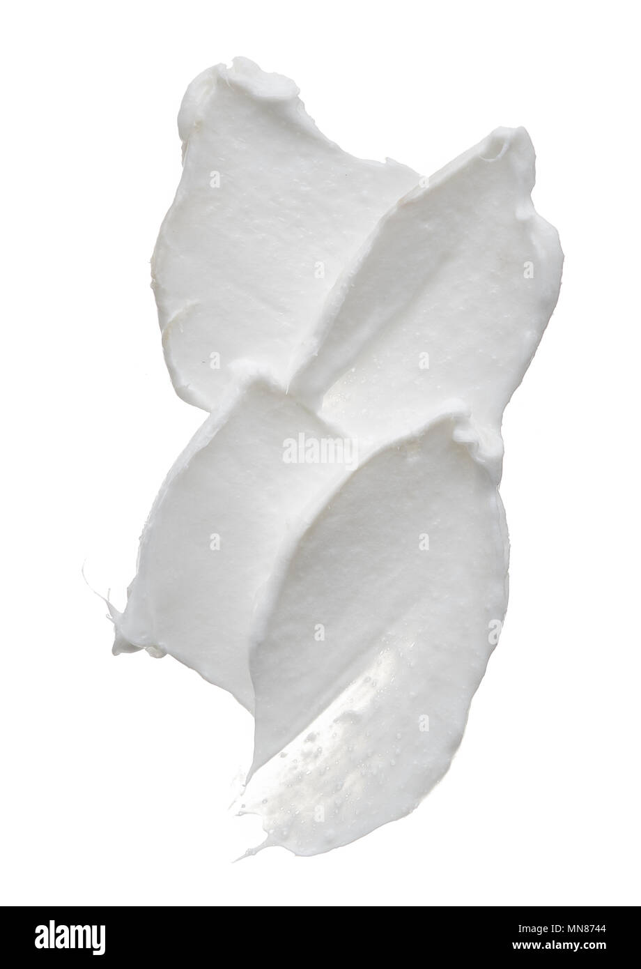 White creamy texture isolated on white background. Smear of face cream