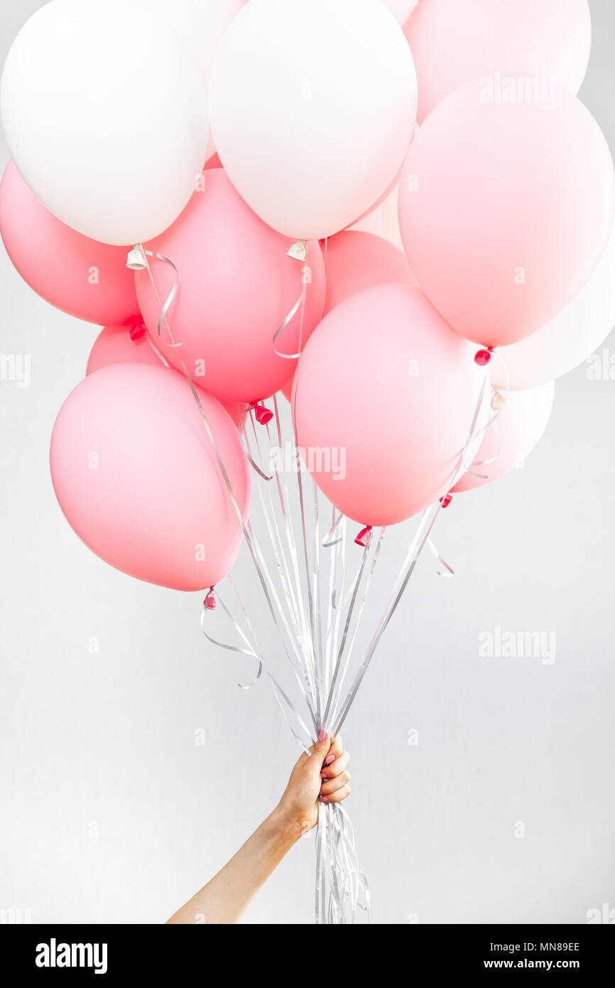 zwart Scepticisme Glimlach Colourful balloons, pink, white, streamers. Helium Ballon floating in  birthday party. Concept balloon of love and valentine Stock Photo - Alamy