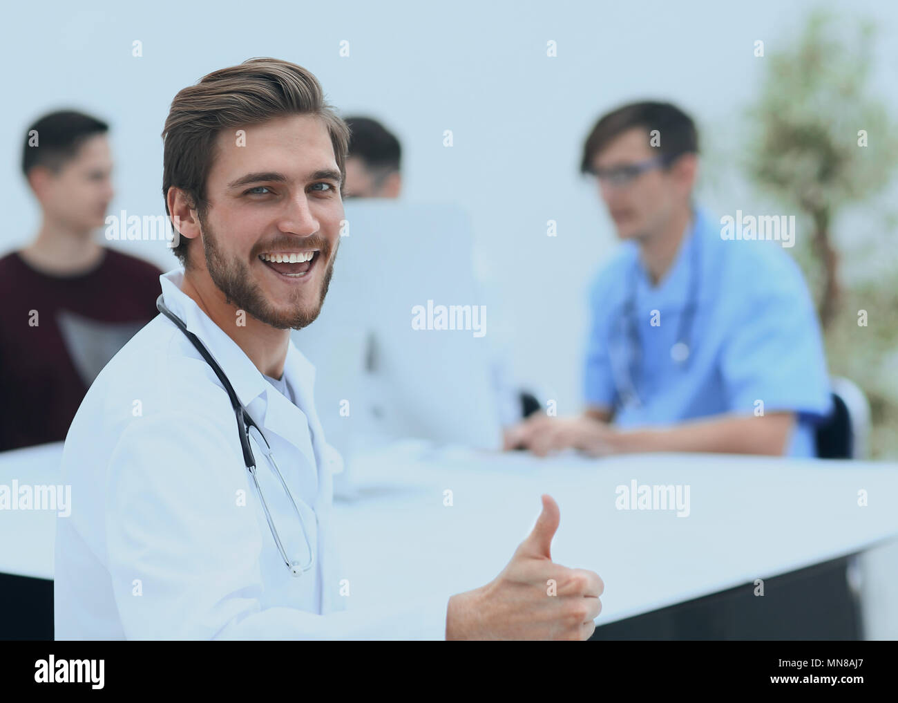 Physicians showing thumbs up hi-res stock photography and images - Alamy