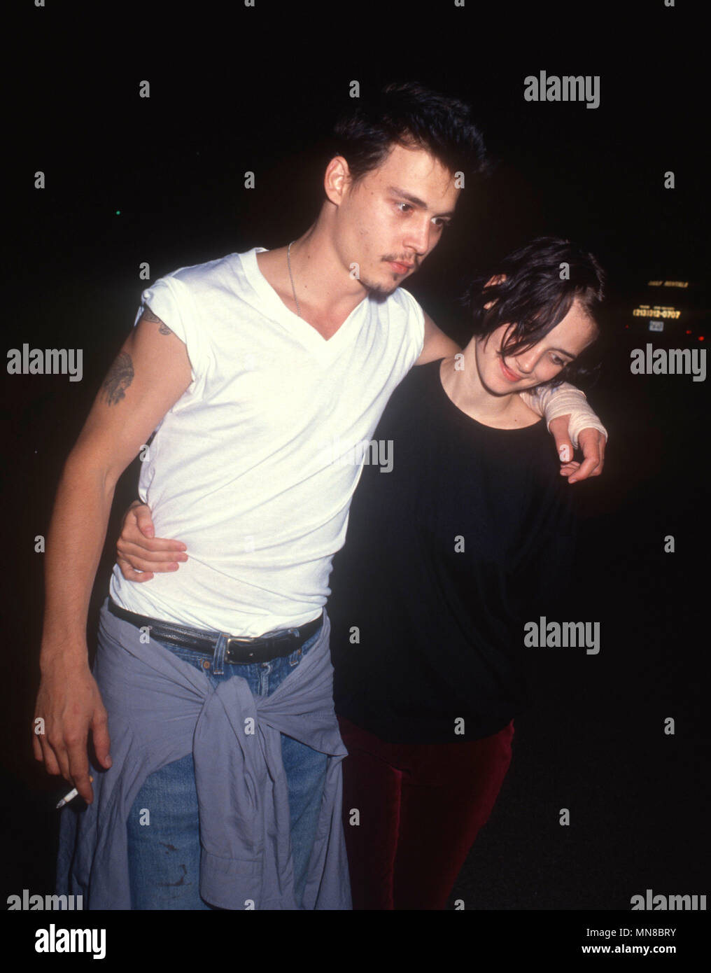 LOS ANGELES, CA - AUGUST 18: (L-R) Actor Johnny Depp and actress Winona