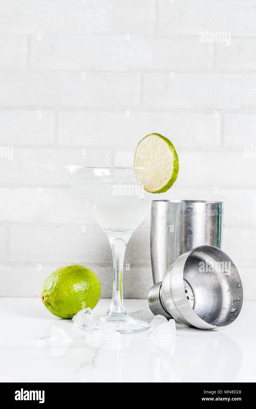 Homemade summer refreshment drink, lime and lemon margarita cocktail