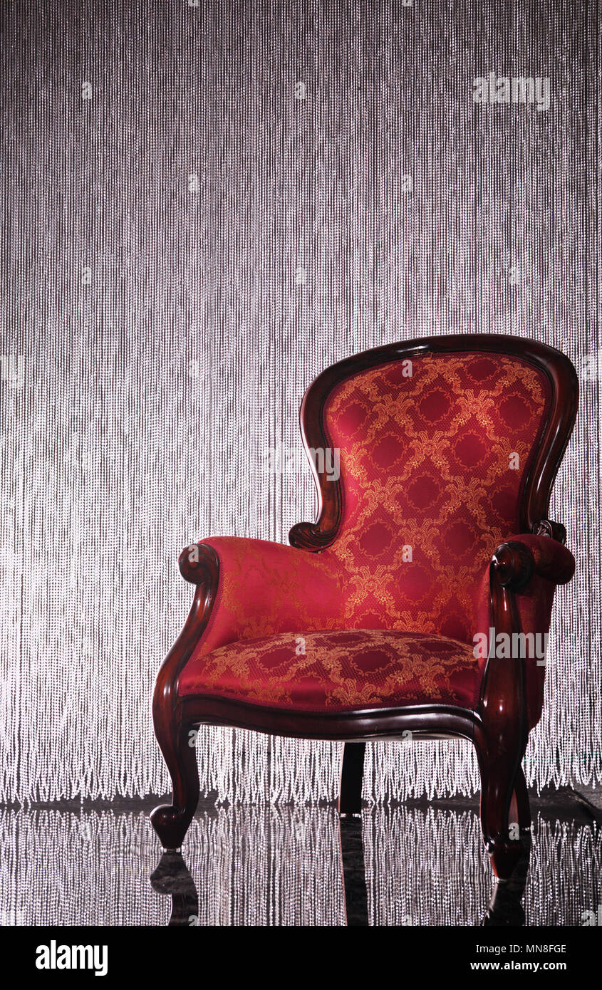 Old-fashioned armchair in the vintage interior Stock Photo - Alamy