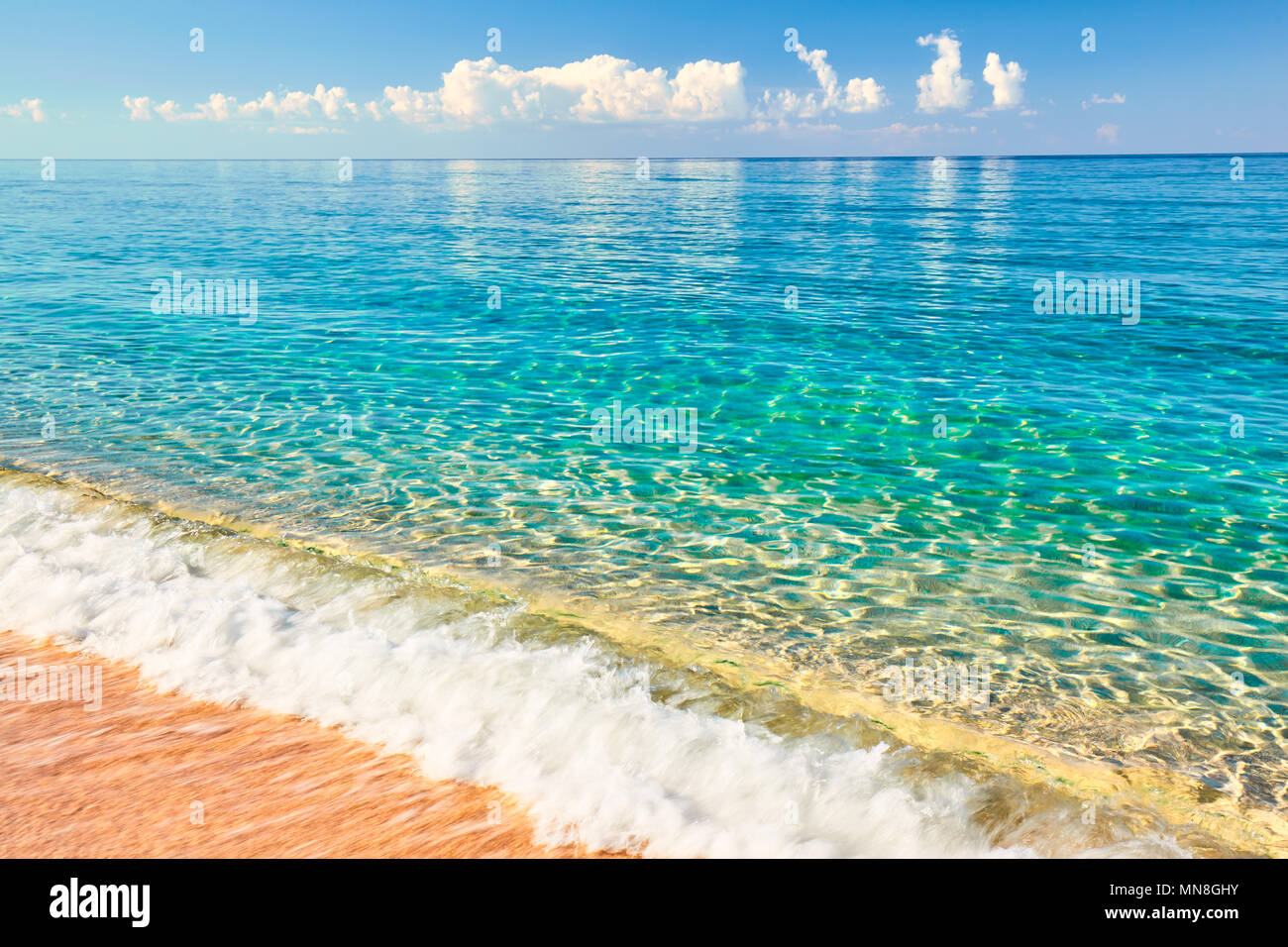 Sea view from tropical beach with sunny sky. Summer paradise beach. Tropical  shore. Tropical sea. Exotic summer beach with clouds on horizon. Ocean beach  relax, outdoor travel Stock Photo - Alamy