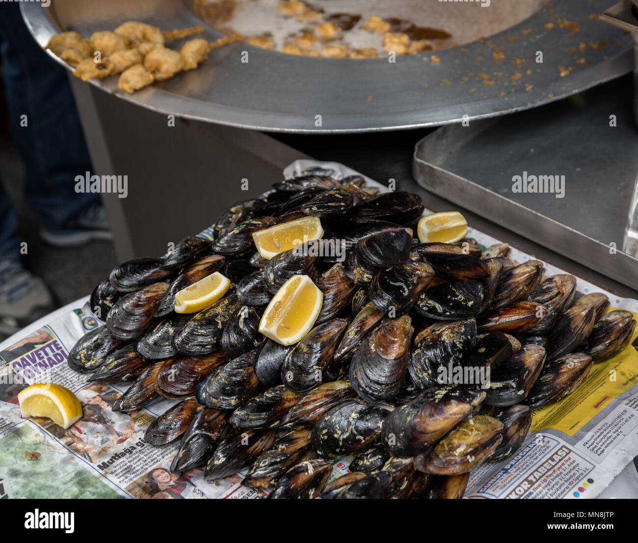 Turkish style appetizer street food stuffed mussels called midye dolma