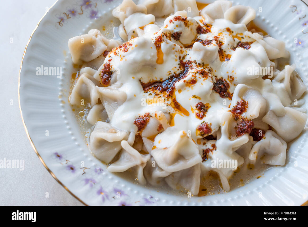 Turkish Manti Manlama / Ravioli with yogurt and fried butter sauce.  Traditional Food Stock Photo - Alamy