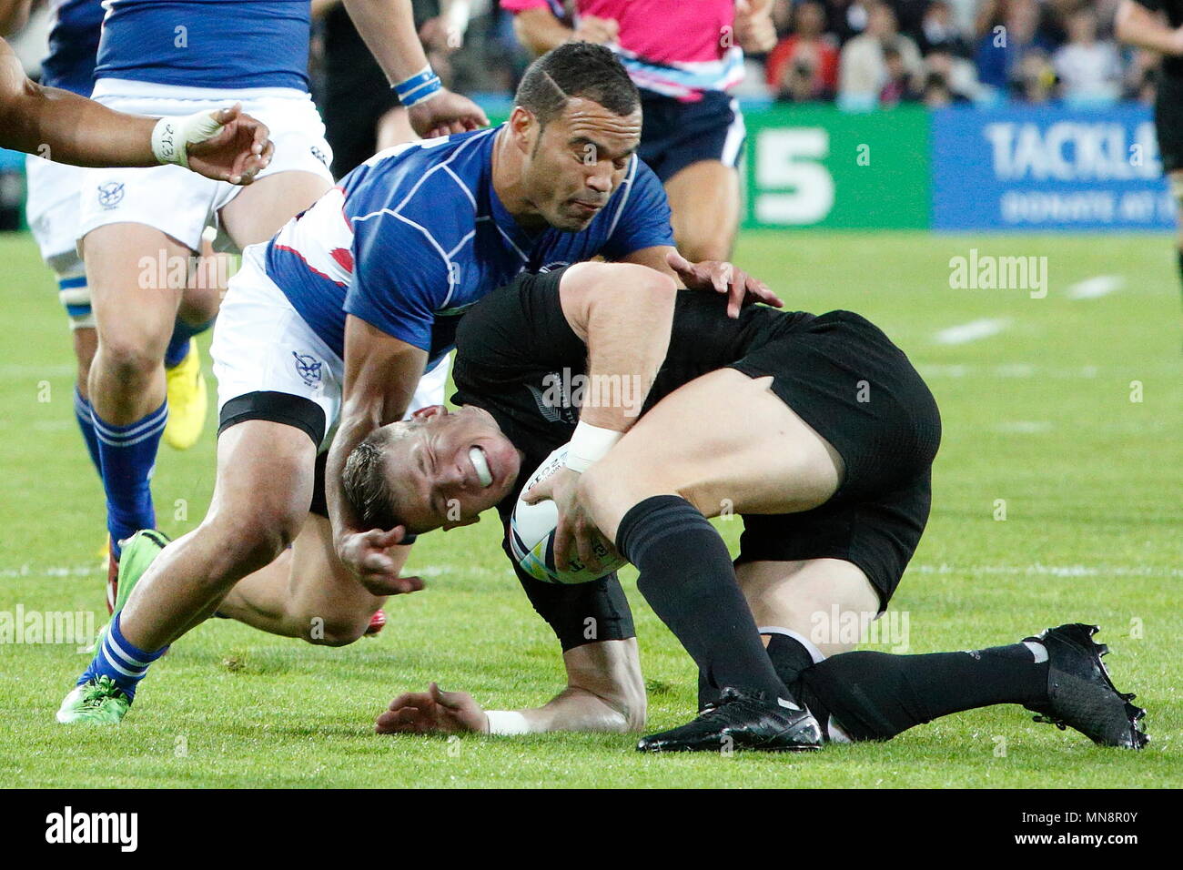 Colin Slade of NZL All Blacks slips and allows David Philander of Namibia to pounce during the IRB RWC 2015 match between New Zealand All Blacks v Namibia- Pool C Match 12 at The Stadium, Queen Elizabeth Olympic Park. London, England. 24 September 2015 Stock Photo