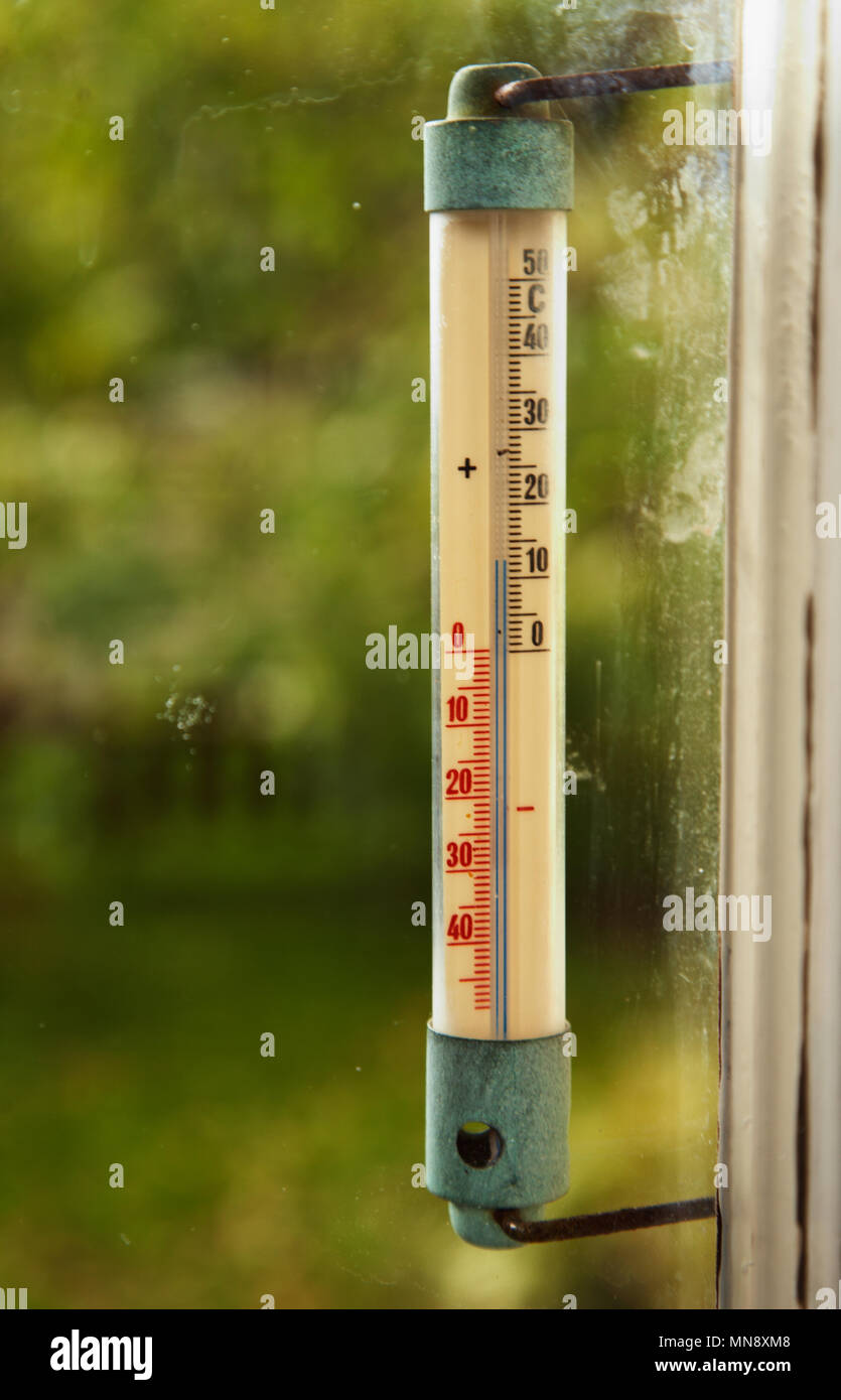 Wooden thermometer outside temperature Stock Photo by ©Egor_1896 247566650