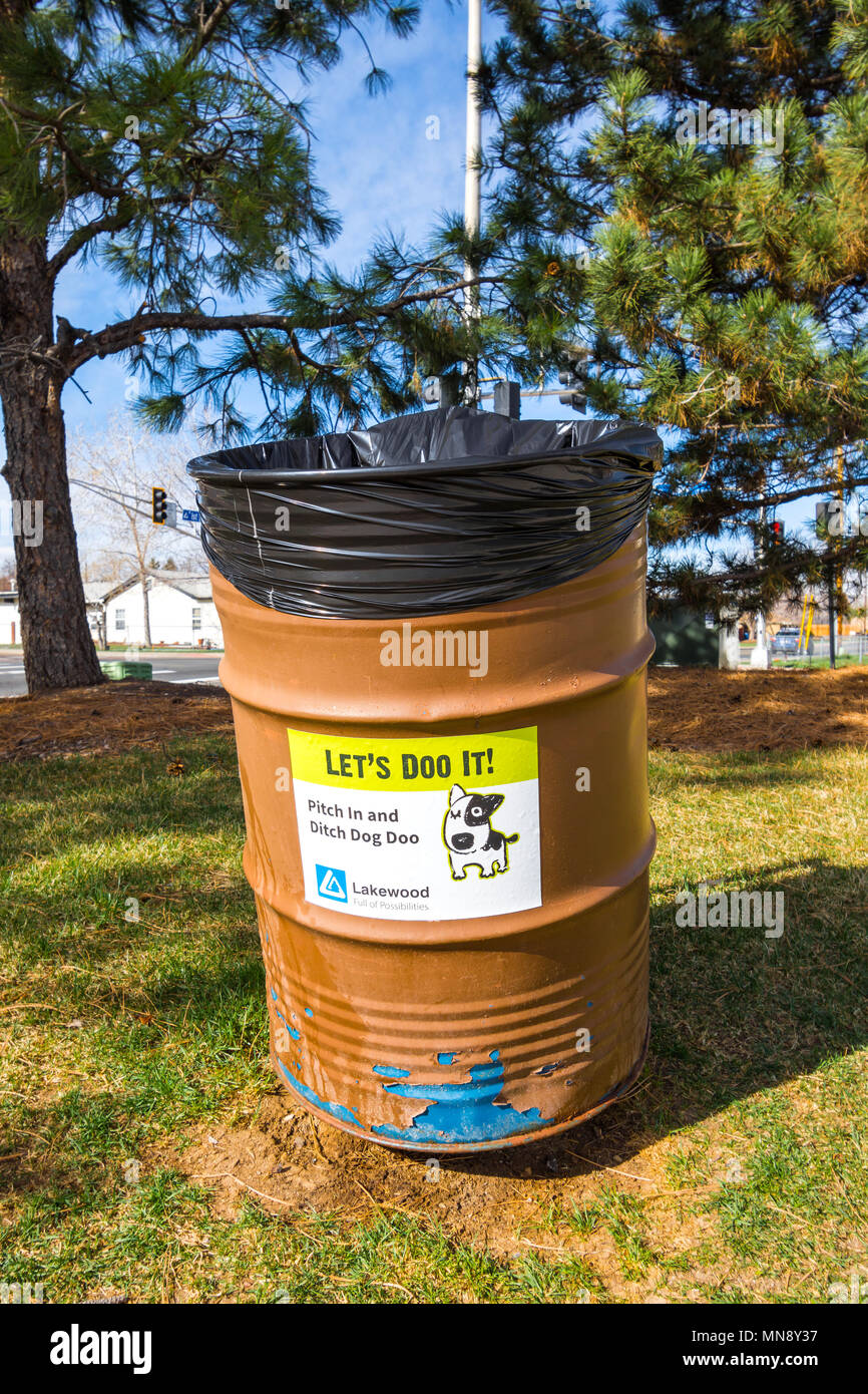 Dog poo dispensers in in O'Kane public park, Lakewood, Colorado, USA. Stock Photo