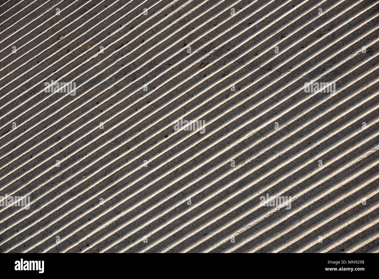 Texture of fiber cement roof sheet, Pattern of weathered the old roof, Corrugated wave asbestos tile background, Old Corrugated Roofing Tile, Gray roofs Stock Photo