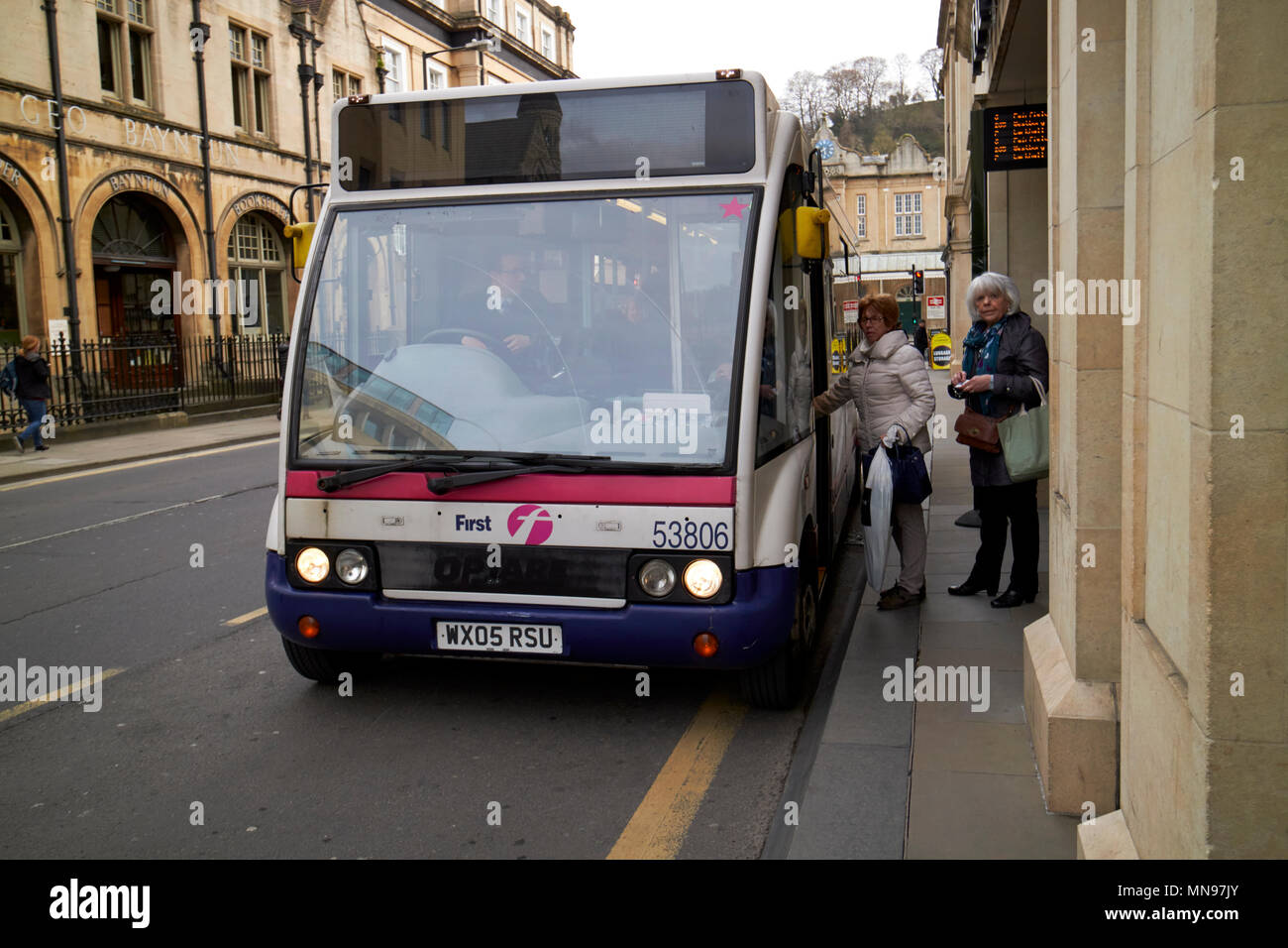 first bus bus service small local Optare Solo M850 midibus minibus Bath England UK Stock Photo