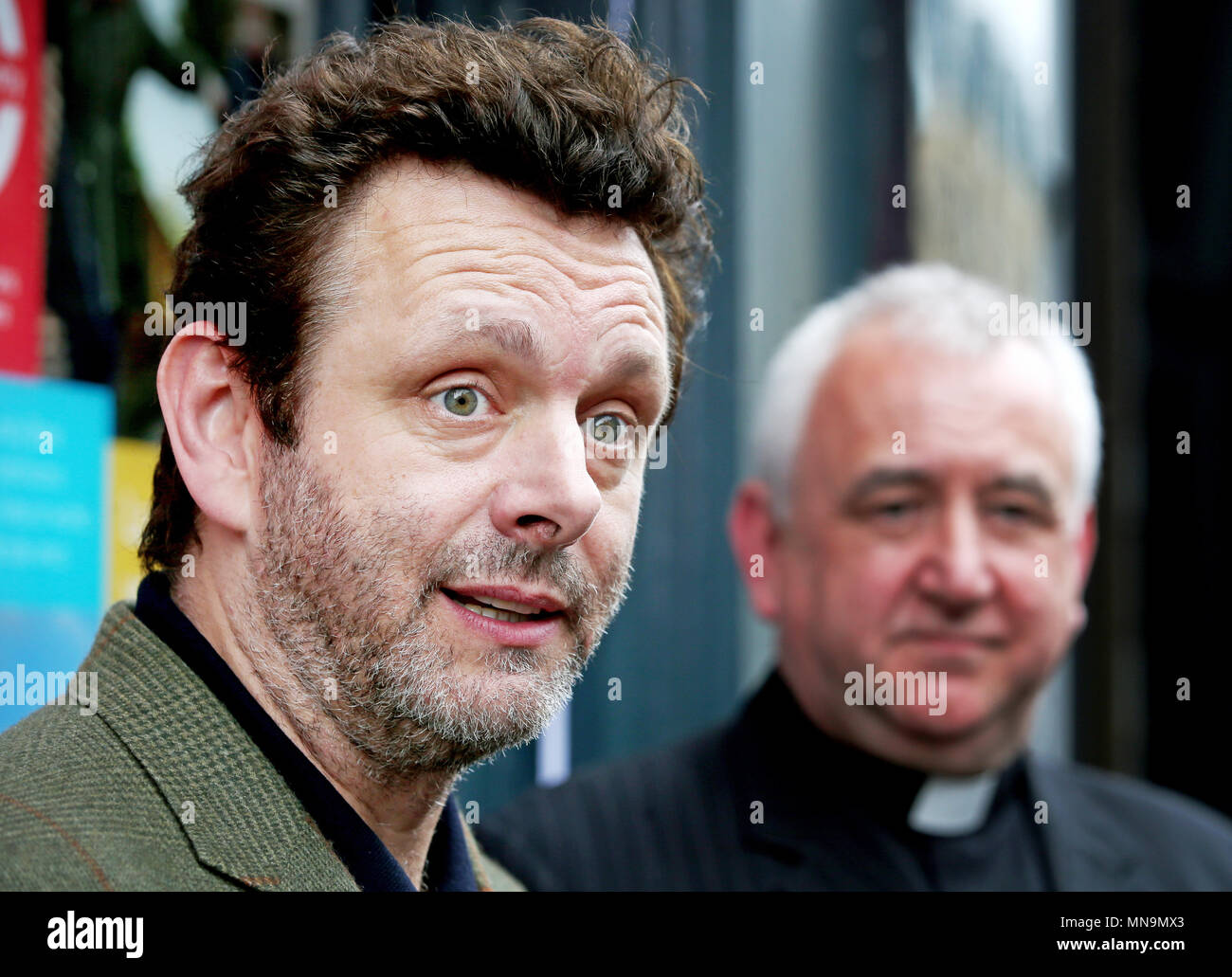 Actor and social campaigner Michael Sheen at the opening of the new Castle Community Bank on Great Junction Street in Leith, Edinburgh. Stock Photo
