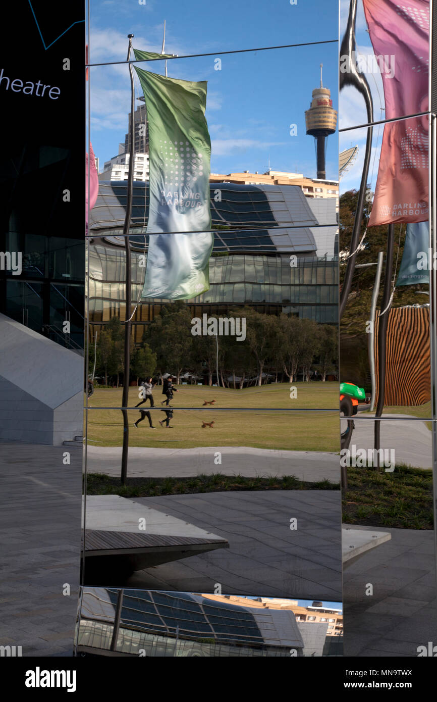 darling harbour reflections in International convention centre theatre glass wall sydney new south wales australia Stock Photo