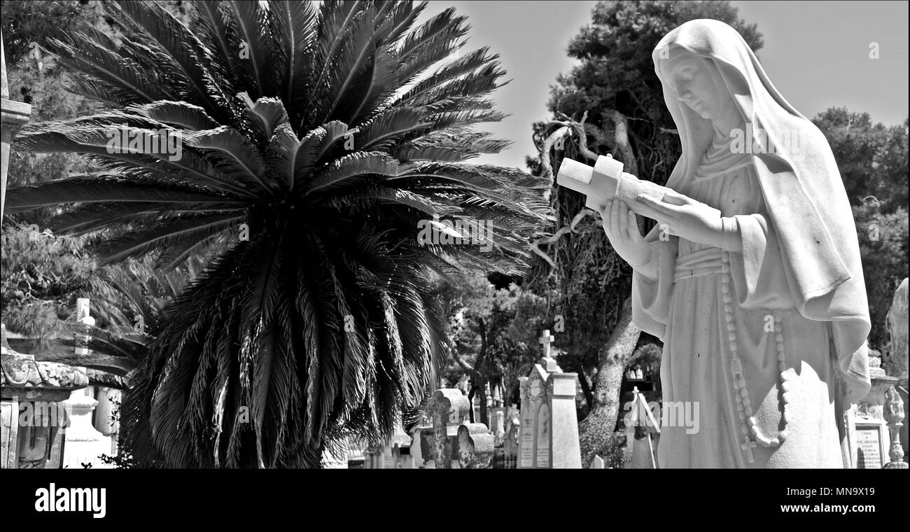 Stone statue of the Virgin Mary Stock Photo