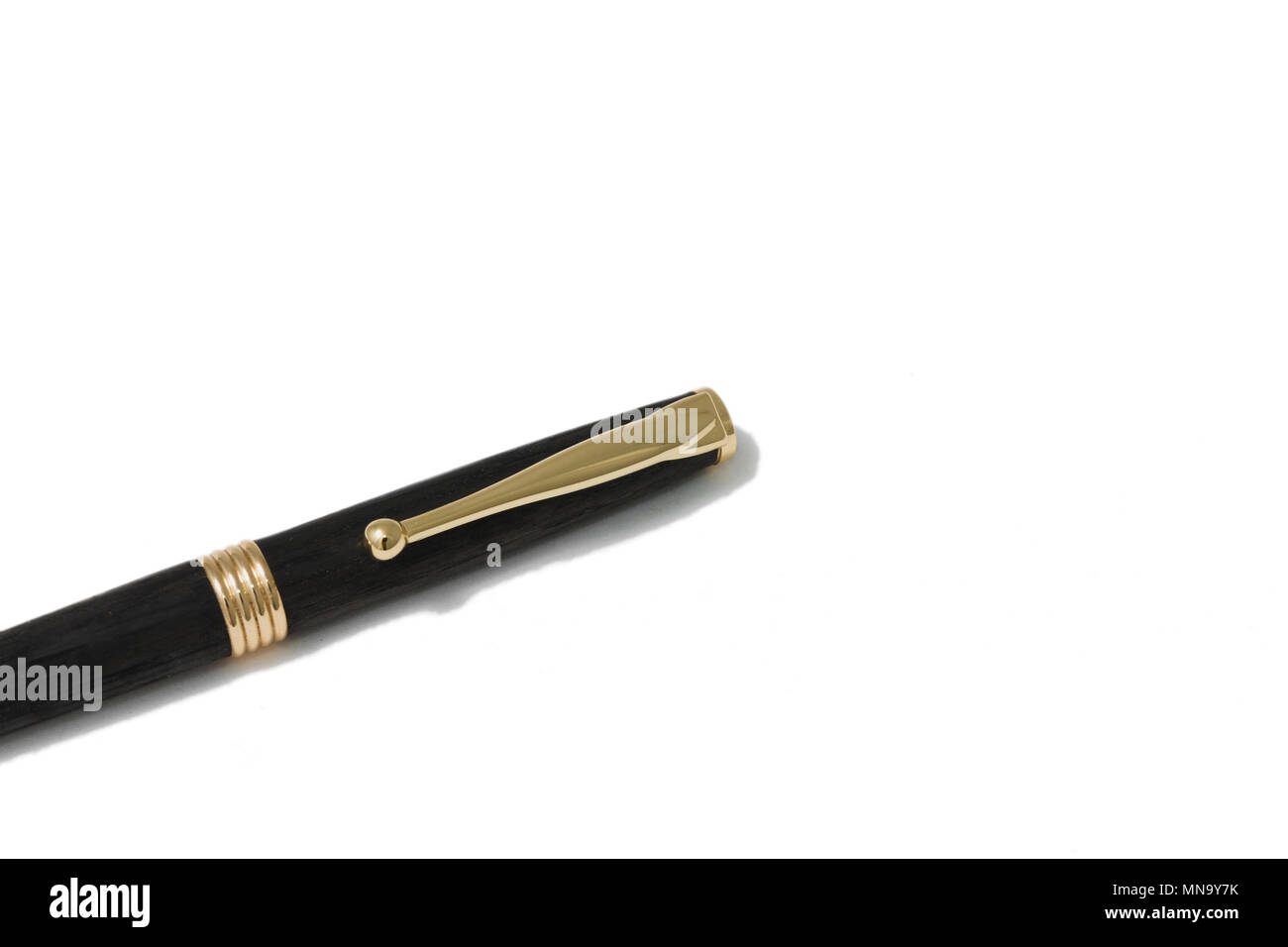 Ballpoint pen made of wood and metal on a white background Stock Photo ...